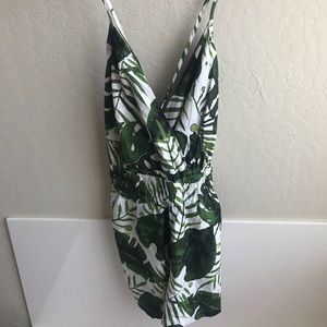White romper with green leaves